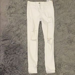 Hollister white ripped skinny jeans (high rise)